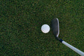 Golf club face and ball close-up, illustrating impact contact point